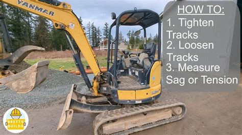 how tight should mini excavator tracks be|mini track tension adjustment.